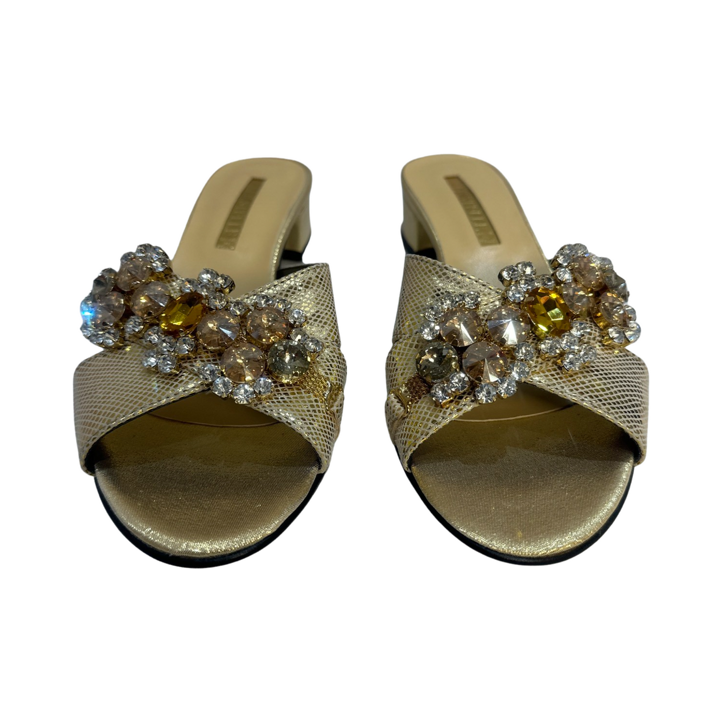 Rhinestone flat mules with decorative embellishments, trendy summer footwear.