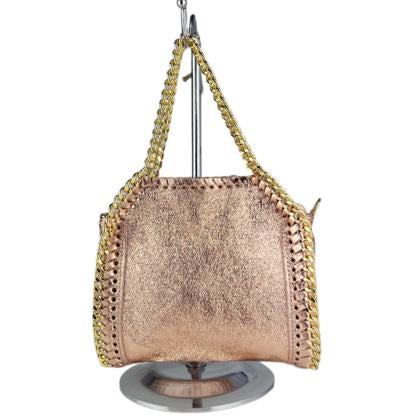 Leather tote bag with laminated gold whipstitch trims and chain shoulder strap.