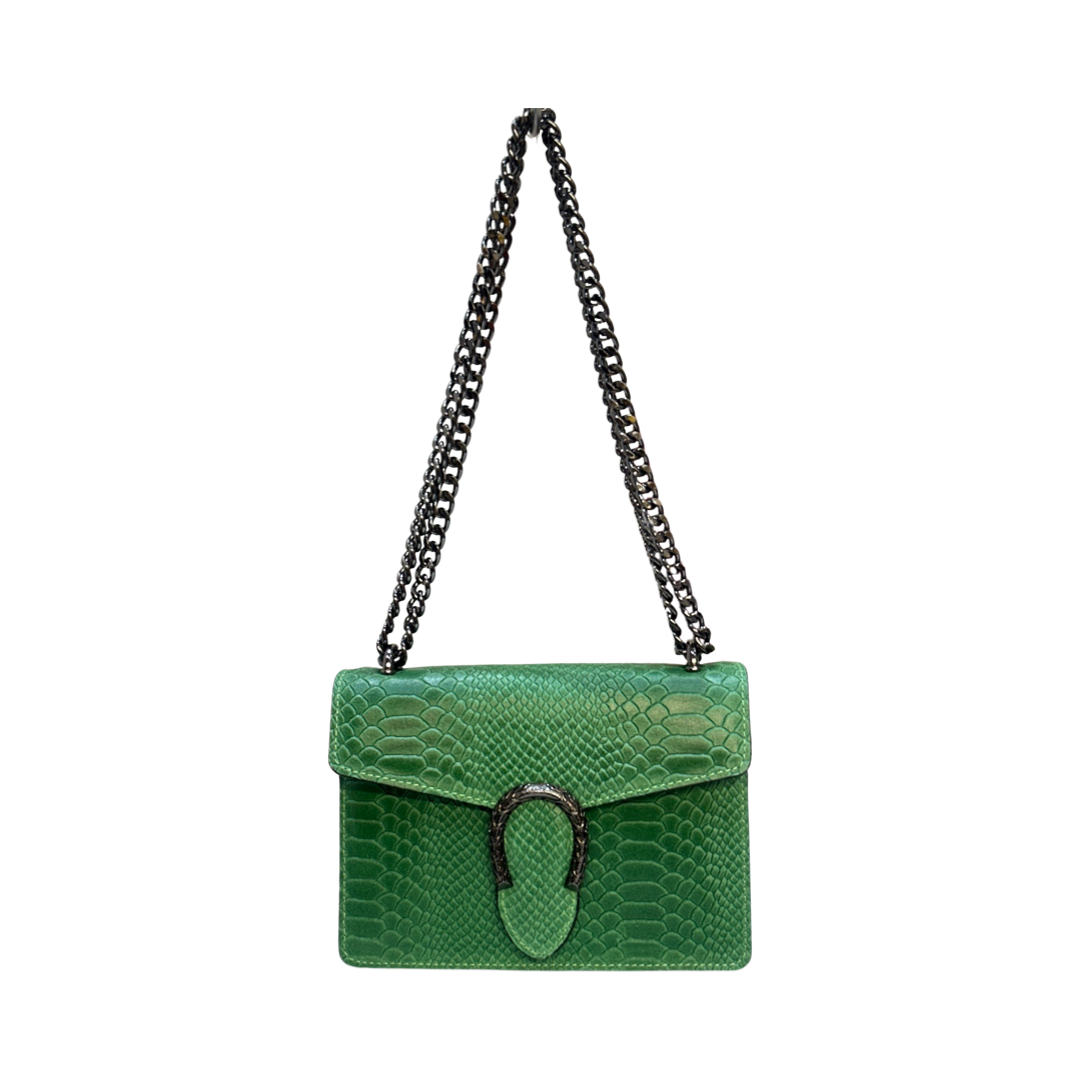 Crossbody leather bag with chain strap and double-headed tiger hardware.