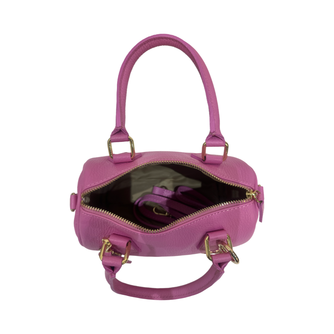 Interior view of small pink leather tote bag with zip closure and shoulder strap.