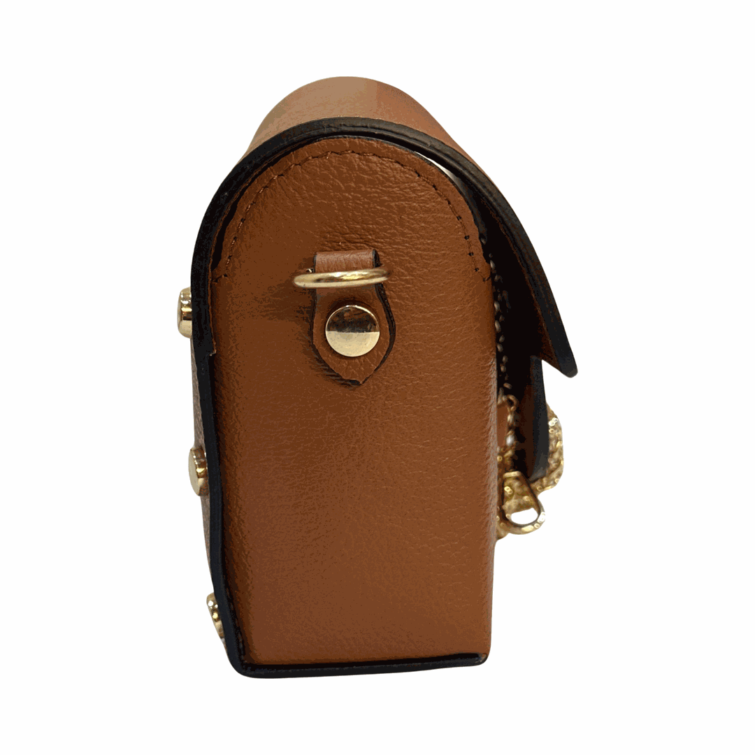 Mini leather tote bag with gold accents and side profile view.