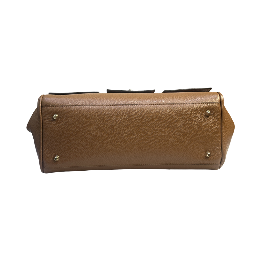 Tan Bottom Smooth finish with artisan stitching for durability
