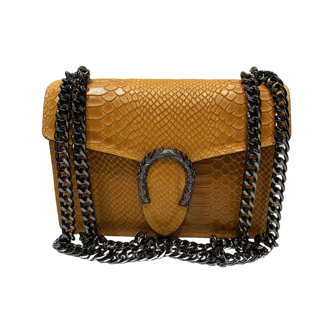 Small crossbody leather bag with chain strap and tiger hardware.