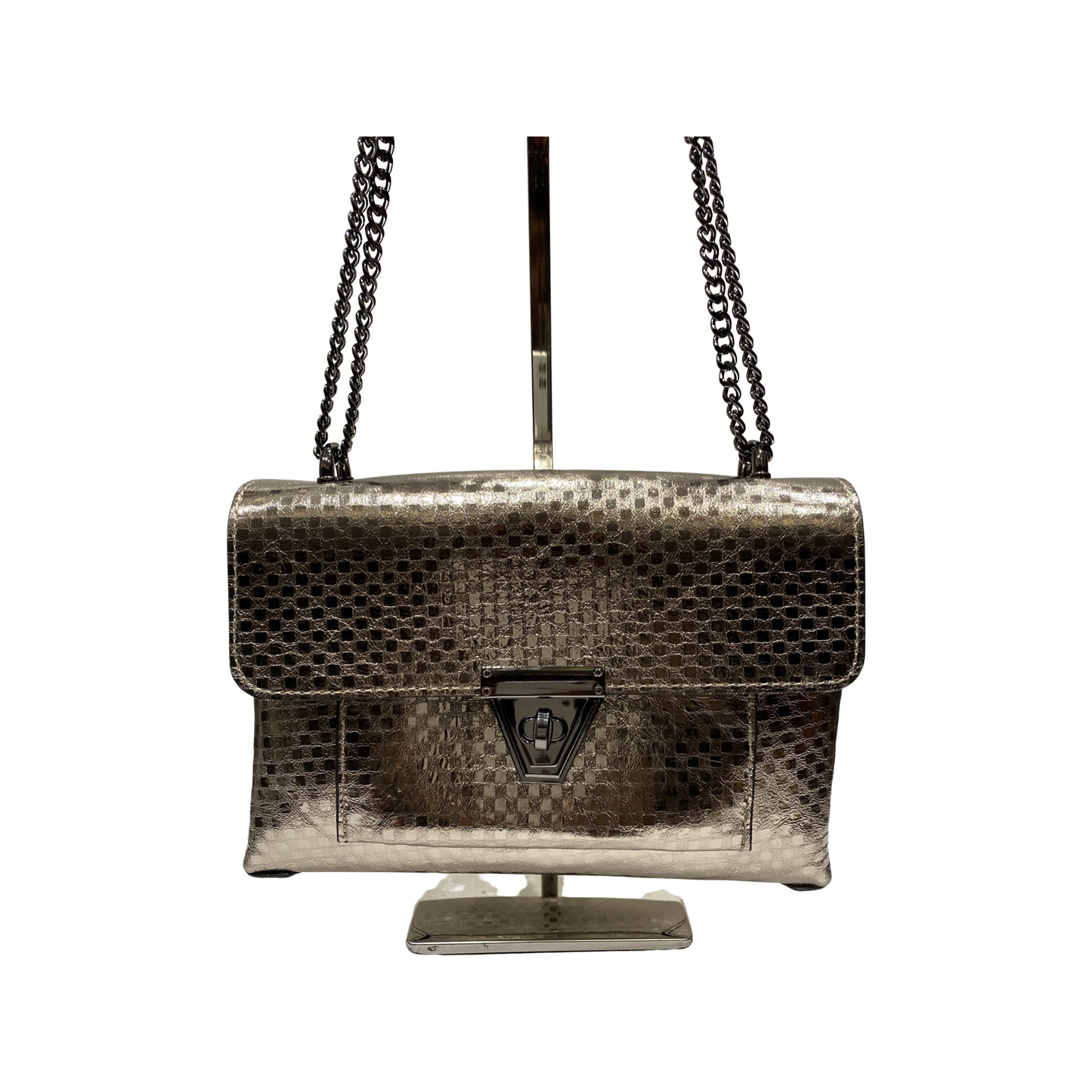 Laminated leather crossbody bag with chain and adjustable strap, front turn lock closure.