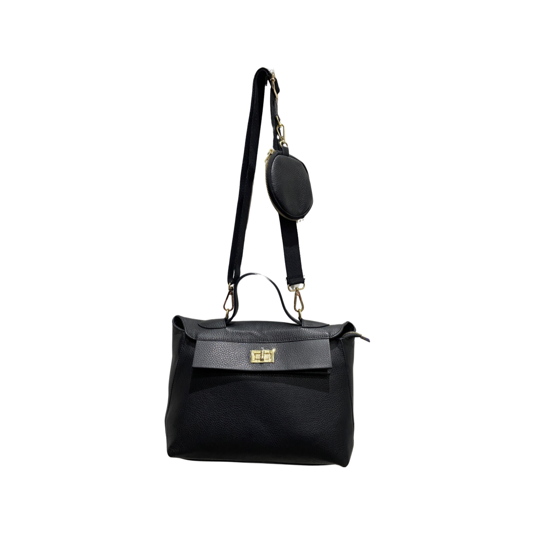 Leather crossbody bag with gold accessories and removable strap.