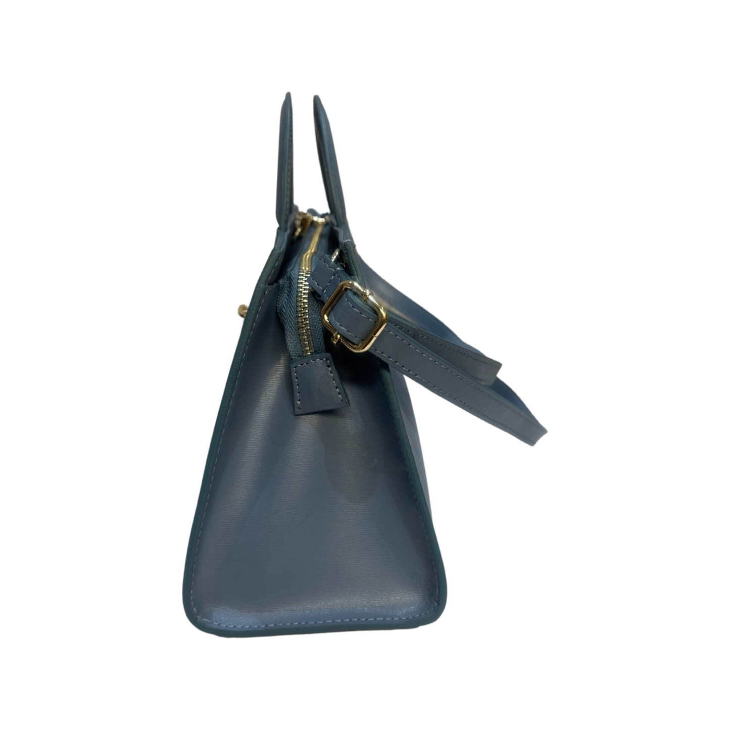 Leather tote bag with top handles and removable shoulder strap in cylinder shape.