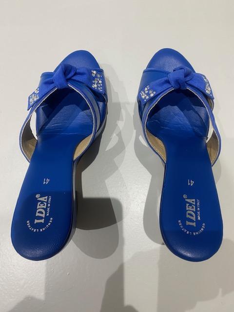 Blue rhinestone suede leather platform wedge sandals with open-toe design.