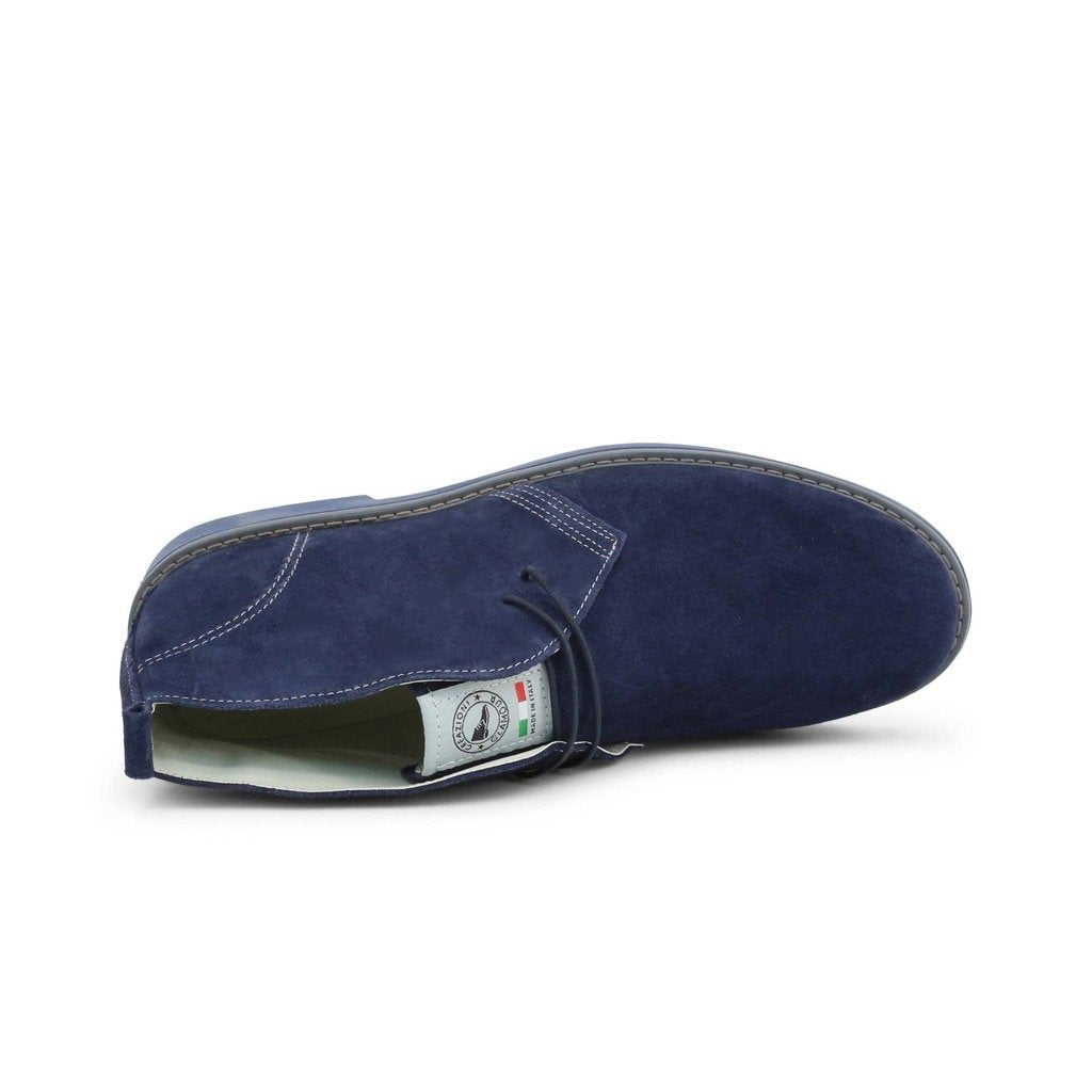 Blue suede lace-up desert boots with stitched detail and rubber sole, made in Italy.