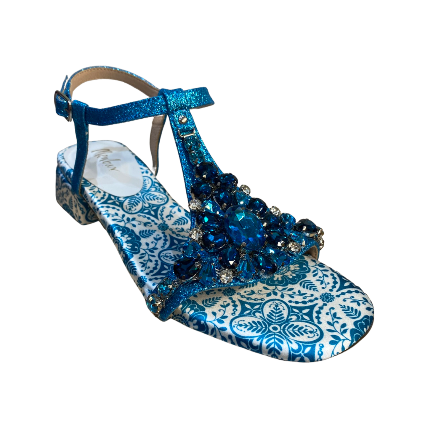 Turquoise blue rhinestone flat sandals with round toe and decorated insole.
