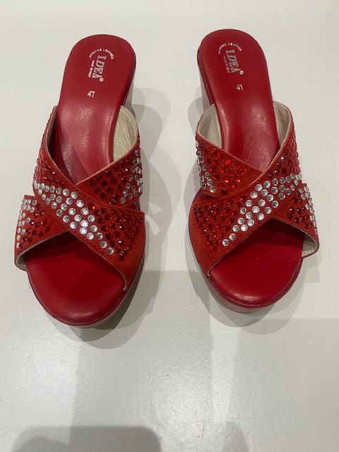 Red rhinestone suede leather platform wedge sandals with open toe, slip-on design, and 3-inch heel.