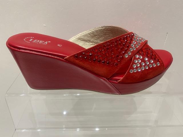 Red rhinestone suede leather platform wedge sandals with open toe and slip-on design.