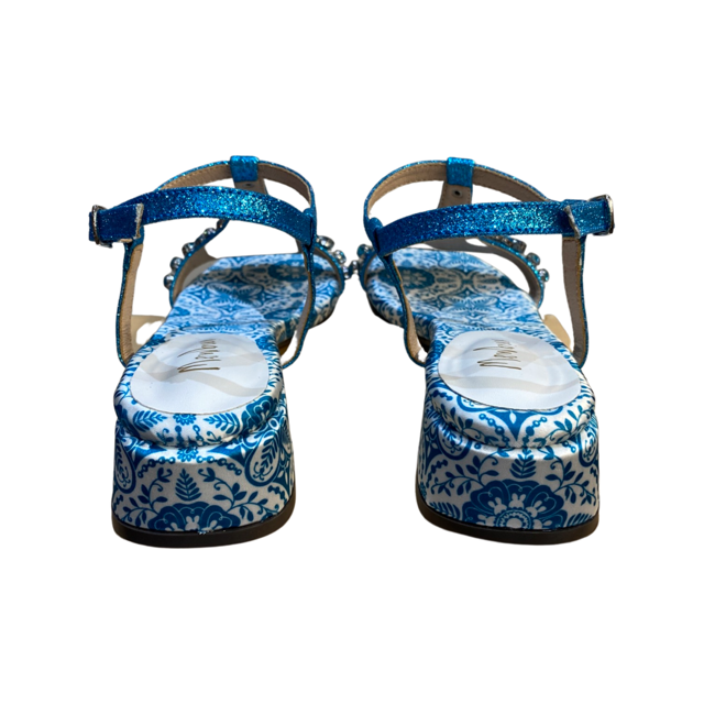 Turquoise blue rhinestone flat sandals with round toe and glamorous style.