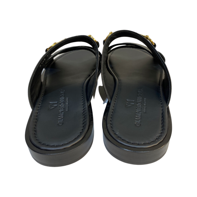 Black crisscross slip-on sandals made from 100% Italian calf leather with gold Giampiero and Nicola Vico logo.