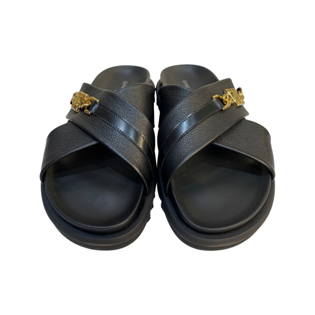Crisscross 2 Strap Slip-on Sandals in black leather with gold logo detail.
