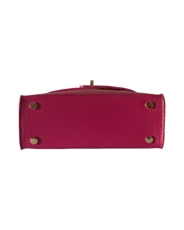 Base of pink leather handbag with four gold-tone protective feet