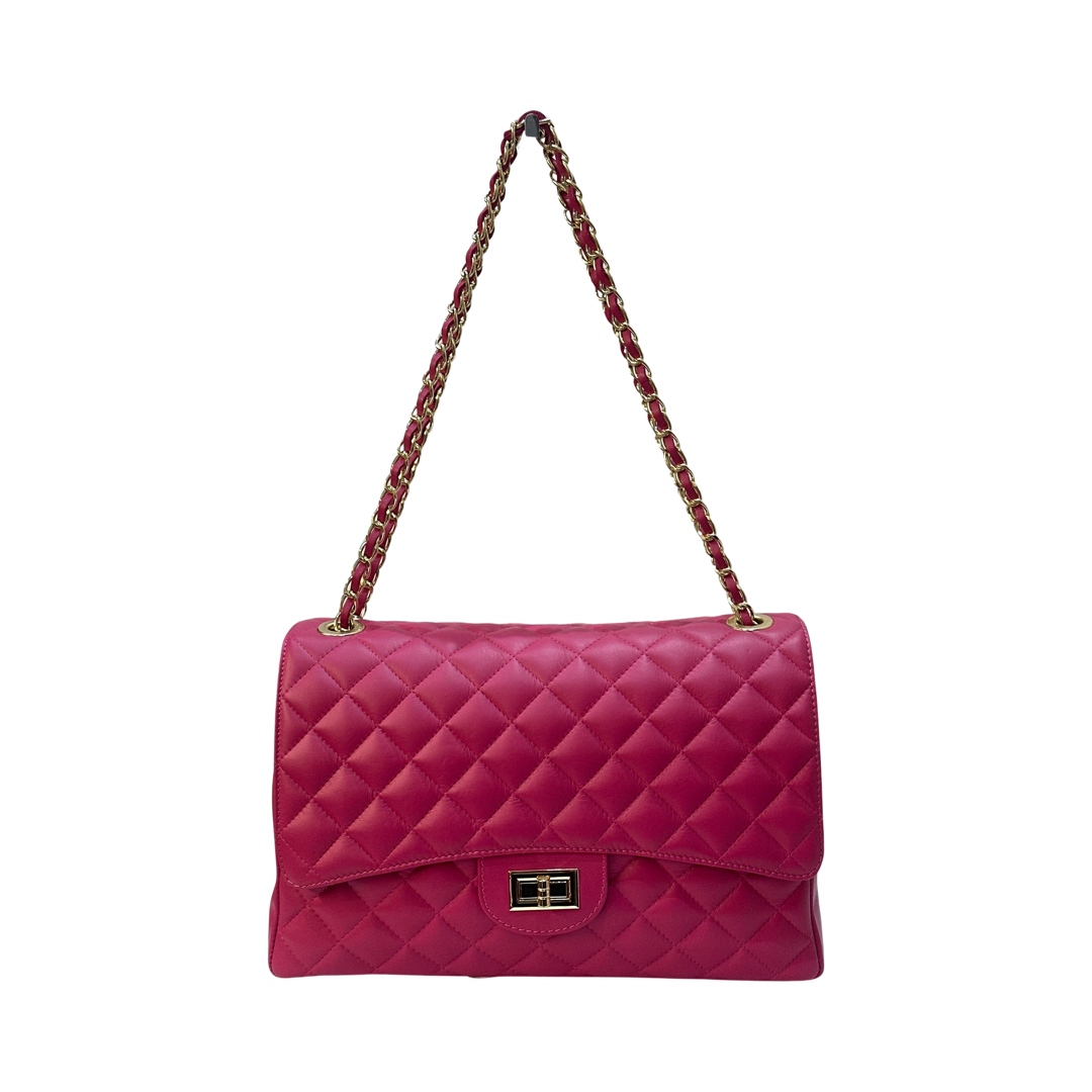 Quilted oversized chain shoulder bag with diamond-stitched design and gold-tone chain strap.