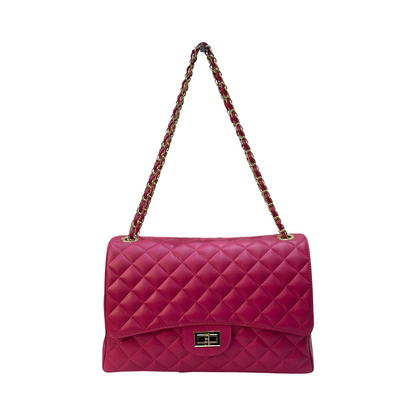 Quilted oversized chain shoulder bag with diamond-stitched design and gold-tone chain strap.