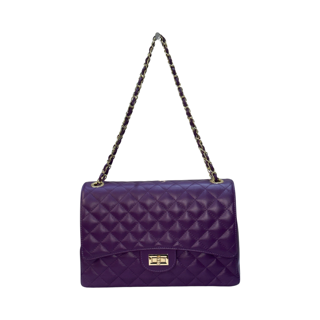 Quilted oversized chain shoulder bag with purple diamond-stitched exterior and gold-tone chain strap.