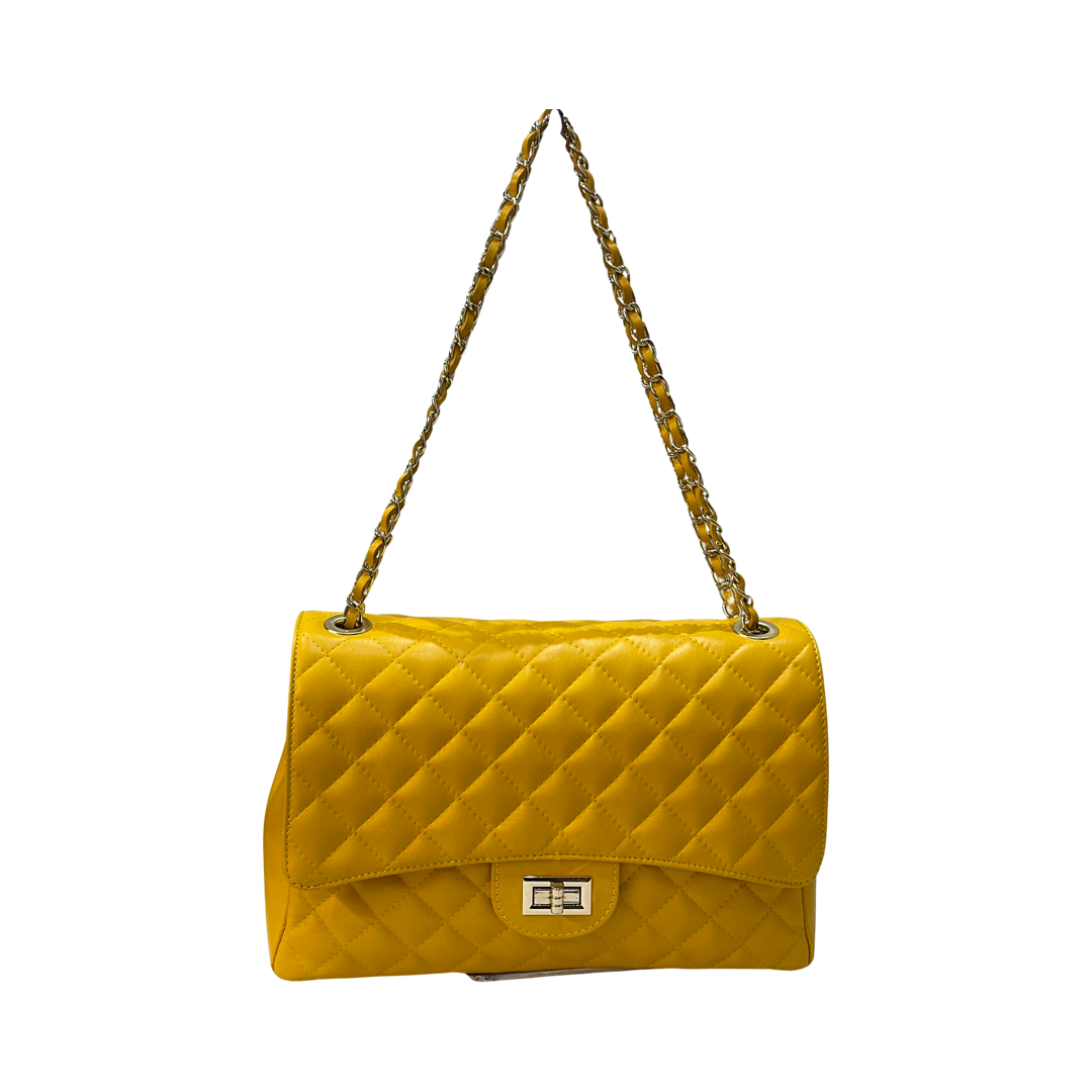 Quilted oversized chain shoulder bag with gold-tone chain straps and diamond-stitched design.