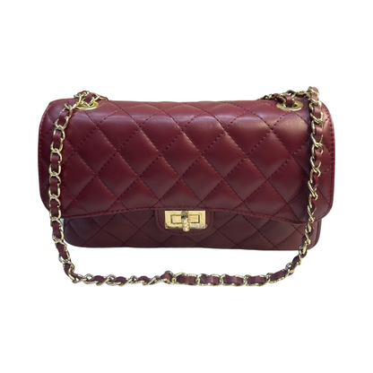 Luxurious quilted chain shoulder bag with diamond-stitched exterior and gold-tone chain strap.