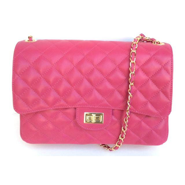 Colorful quilted oversized chain shoulder bag with gold-tone chain strap and turn-lock closure.