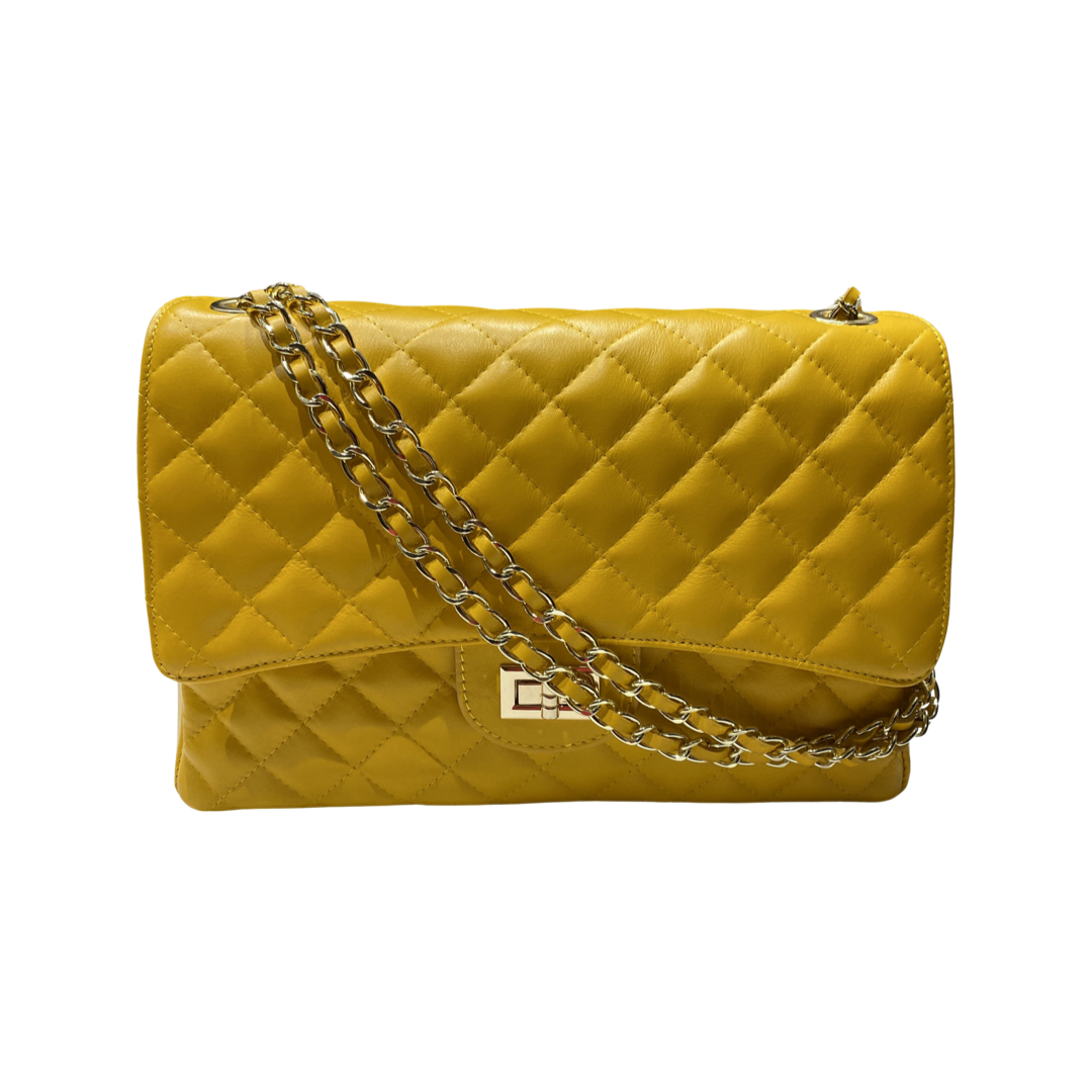 Quilted oversized chain shoulder bag with gold-tone chain and diamond-stitched pattern.