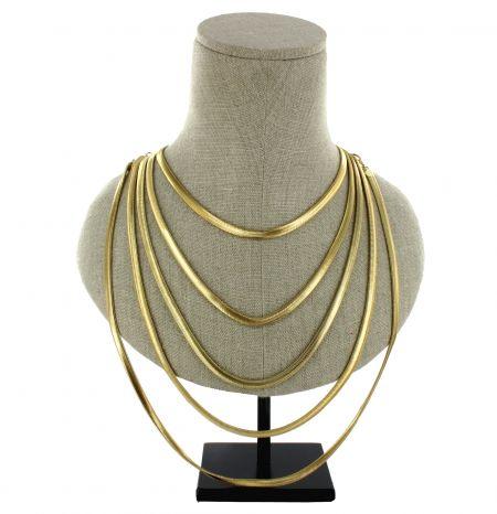 Menbur Waterfall Necklace with layered metal design displayed on a mannequin.