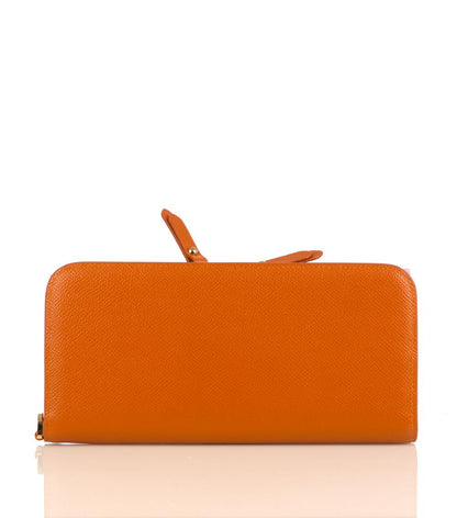 Rectangular tan leather purse wallet with zip opening and grained texture.